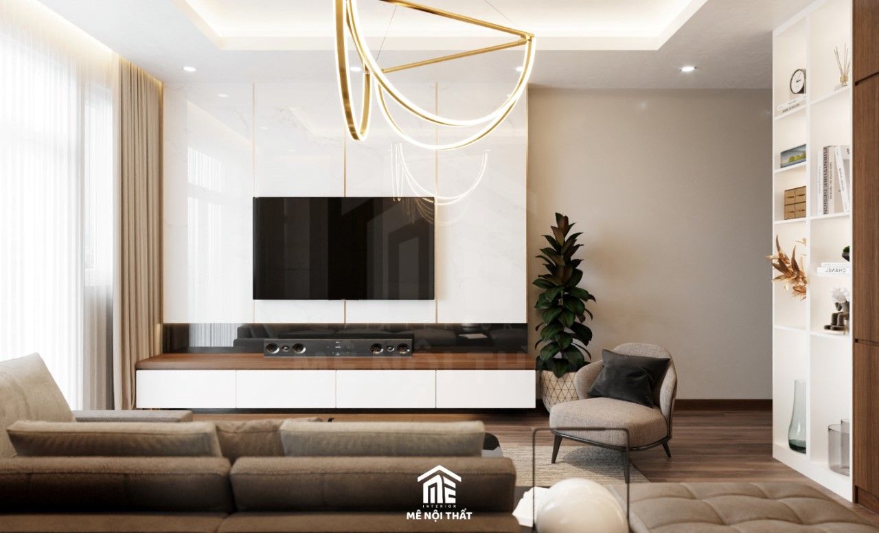 Hệ tủ tivi treo tường kết hợp cùng vách PVC chạy chỉ vàng tôn lên nét đẹp sang trọng cho không gian phòng khách