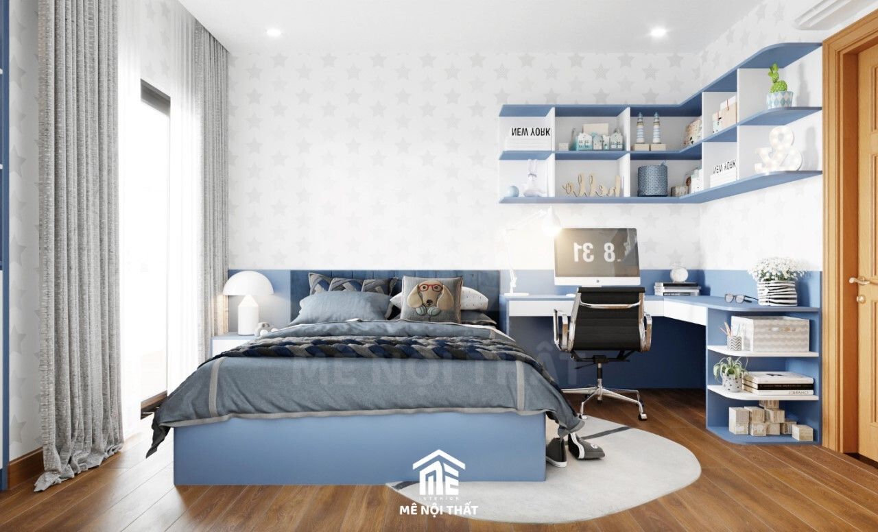 Phòng ngủ bé với tông màu xanh được kê chiếc bàn học chữ L rộng rãi cùng hệ kệ sách, kệ trang trí