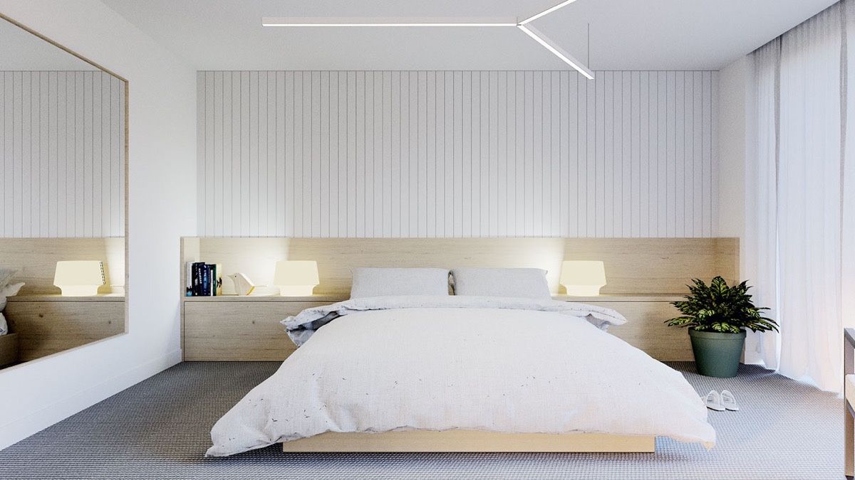 Một phòng ngủ màu trắng tạo ra không gian tinh tế và thư thái.