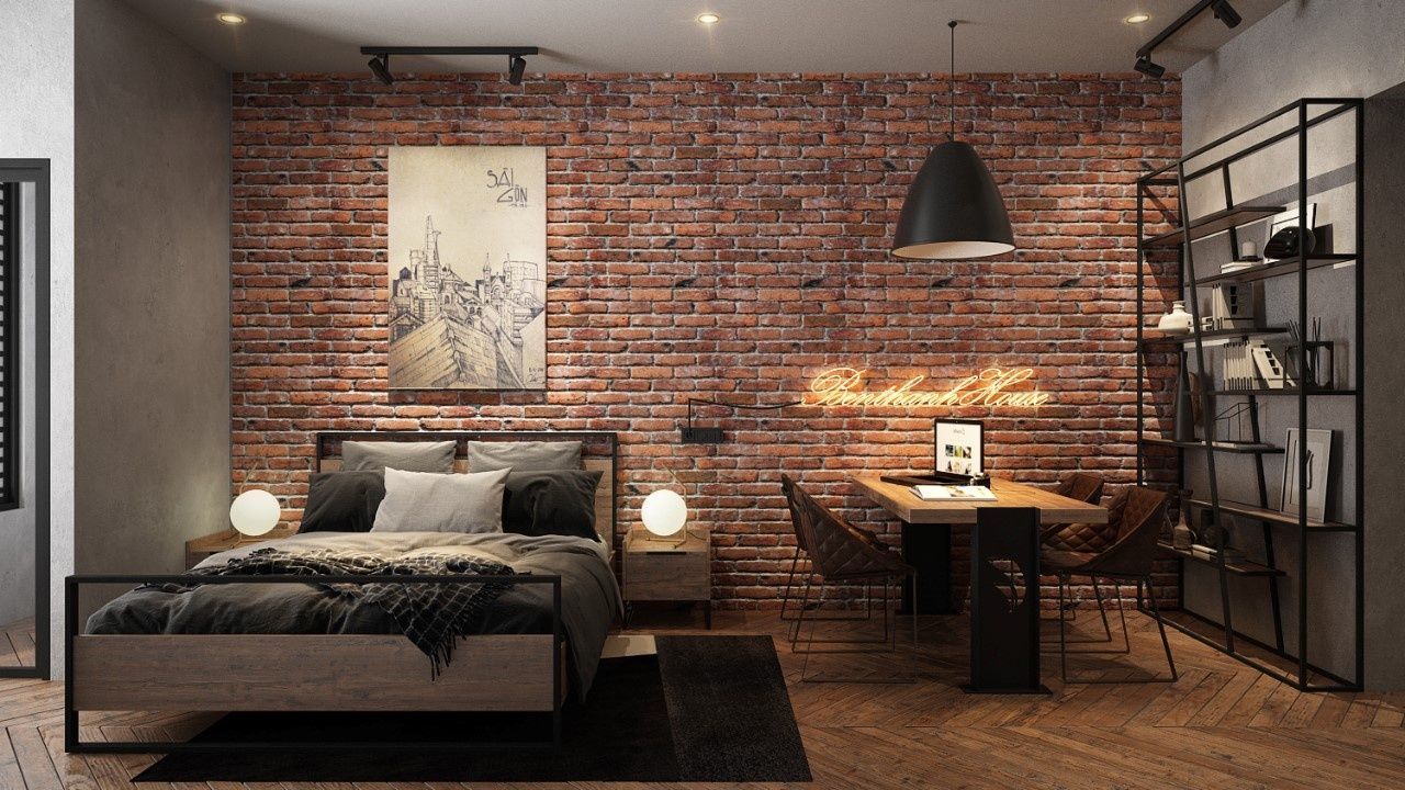 Phòng ngủ Industrial với giường sắt đen, tường gạch mộc và ánh sáng đèn treo kim loại.