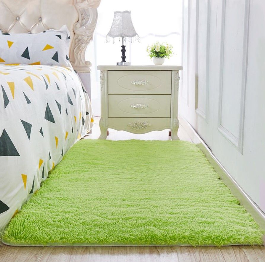 Một chiếc thảm trải sàn phòng ngủ đẹp giúp tăng thẩm mỹ cho tổng thể không gian
