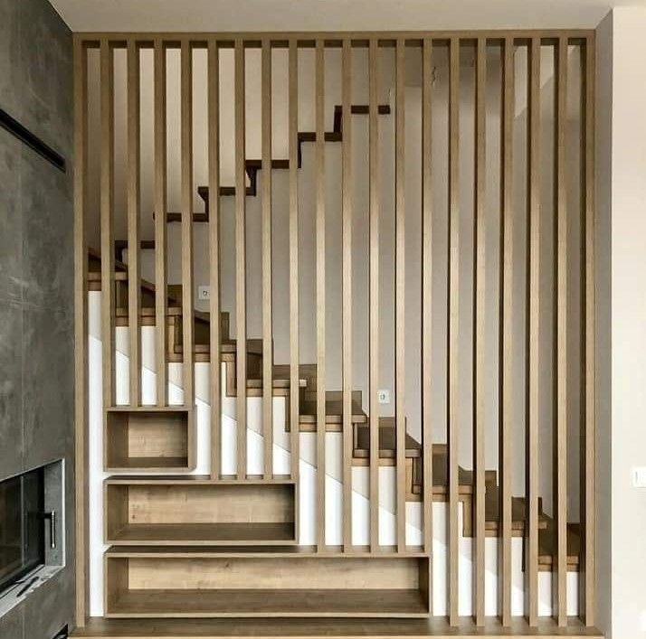Vách ngăn cầu thang dạng thanh lam kết hợp hộc đựng đồ