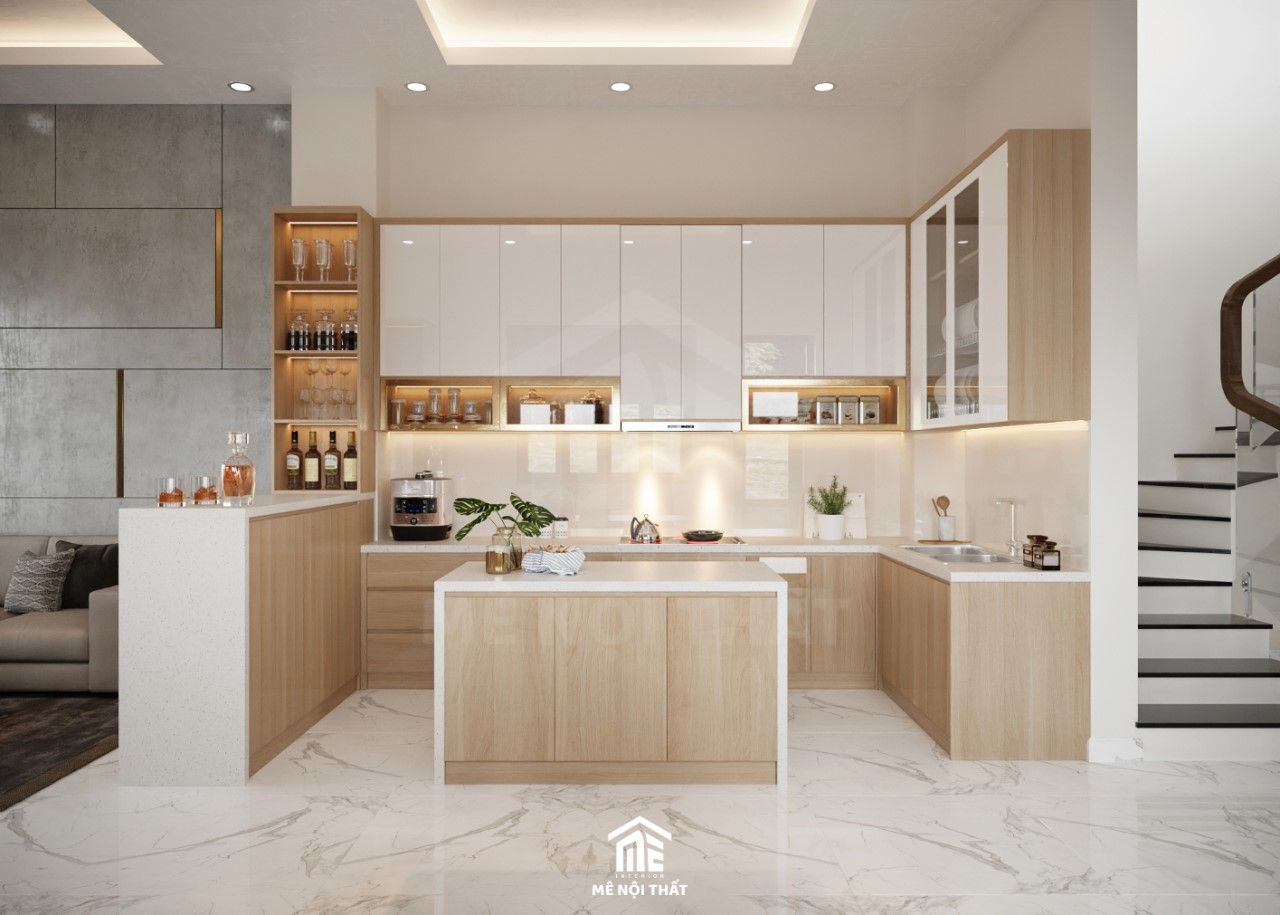 Phong bếp được thiết kế với tủ bếp hình chữ L tiết kiệm thêm không gian cho căn nhà